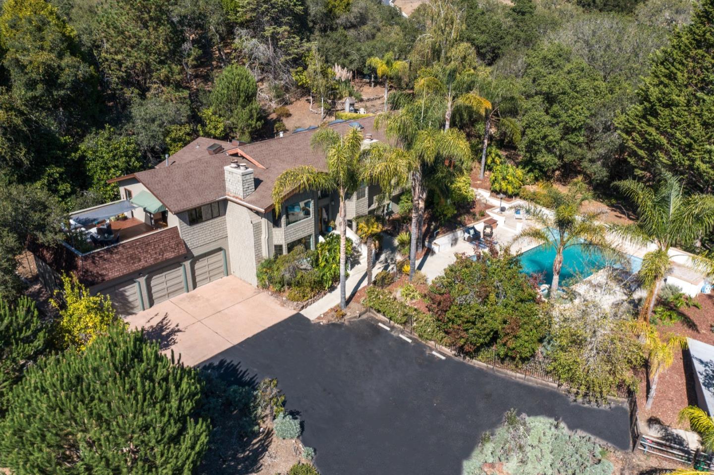 560 Hidden Valley Road Soquel, CA 95073 - Photo 6 of 59 an aerial view of a house with a yard and lake view