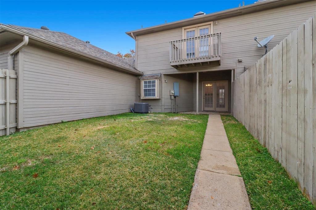 814 Custer Street Arlington, TX 76014 - Photo 17 of 17 a view of a backyard of the house