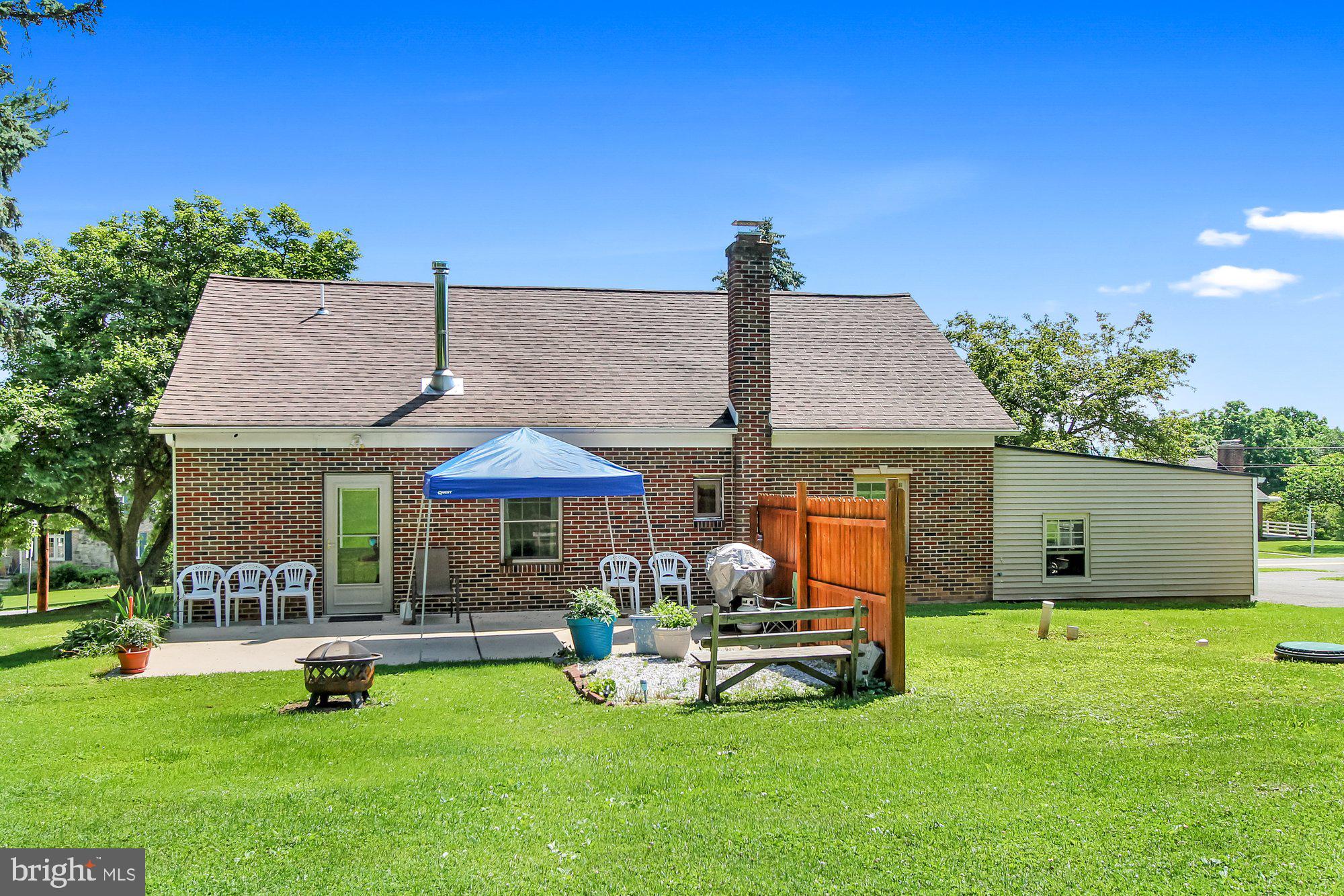 528 Hain Road Sinking Spring, PA 19608 - Photo 22 of 28 a view of a house with backyard porch and sitting area