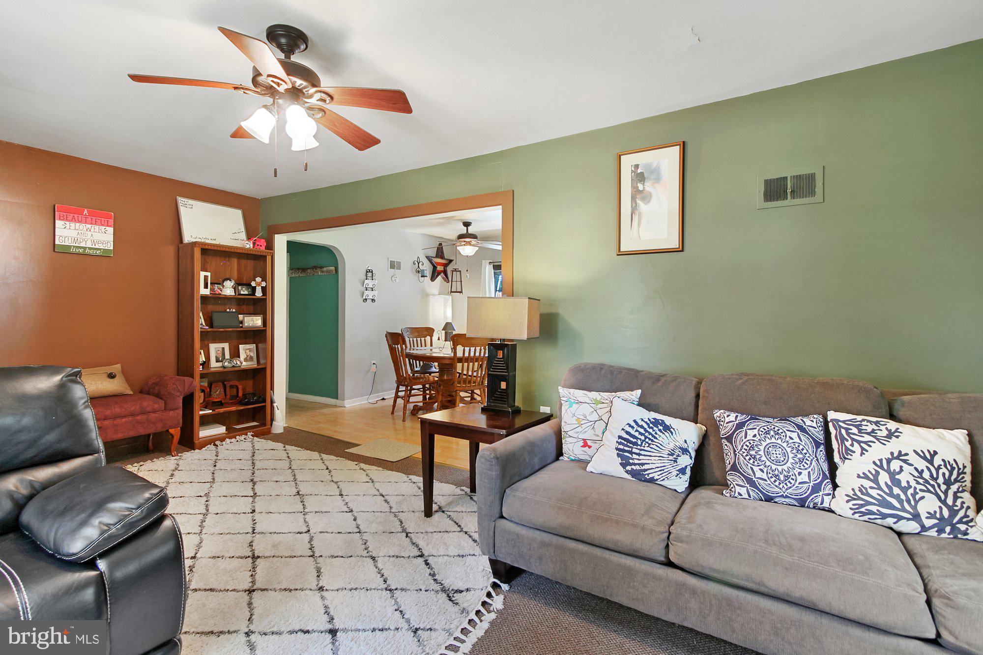 528 Hain Road Sinking Spring, PA 19608 - Photo 5 of 28 a living room with furniture and a flat screen tv