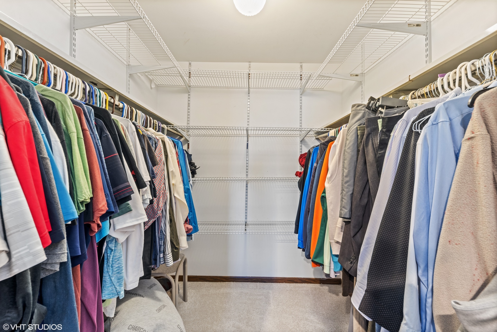 1400 North Elmhurst Road, Unit 203 Mount Prospect, IL 60056 - Photo 8 of 13 a view of walk in closet with clothes
