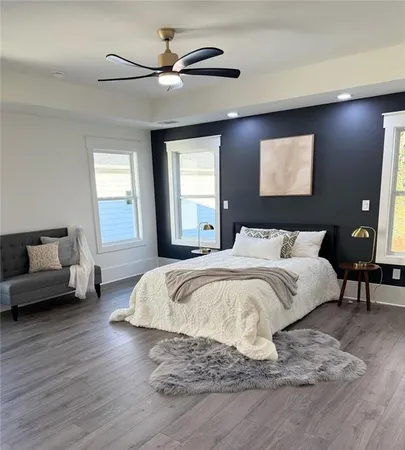 a living room with furniture and a rug
