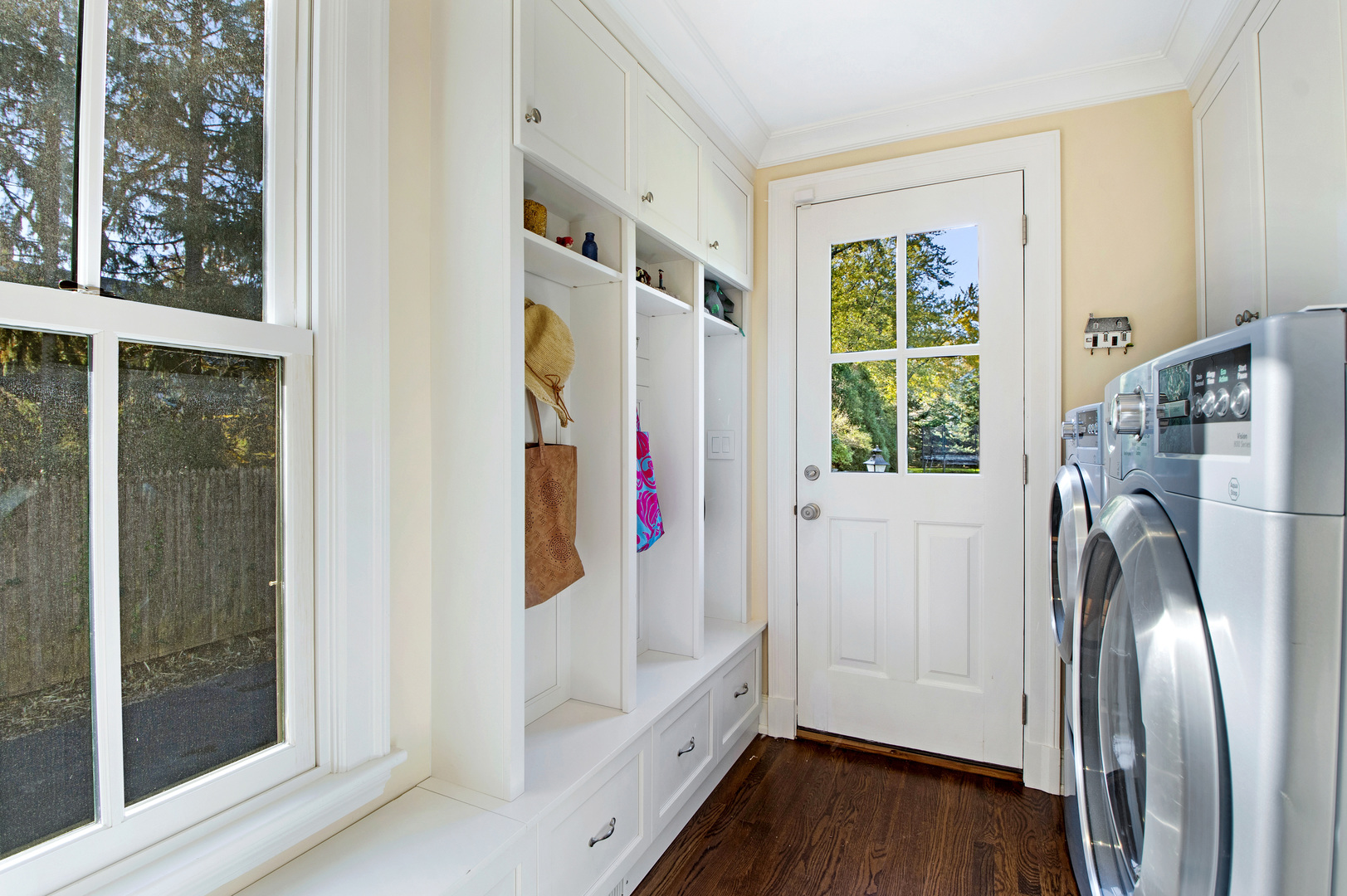 1380 Elm Tree Road Lake Forest, IL 60045 - Photo 14 of 43 a view of a kitchen with wooden floor and a refrigerator