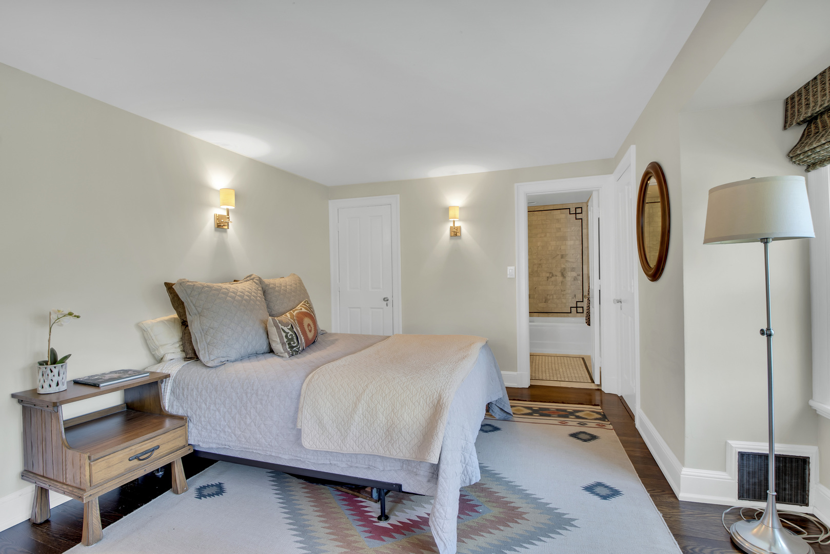 1380 Elm Tree Road Lake Forest, IL 60045 - Photo 25 of 43 a bedroom with a bed and wooden floor