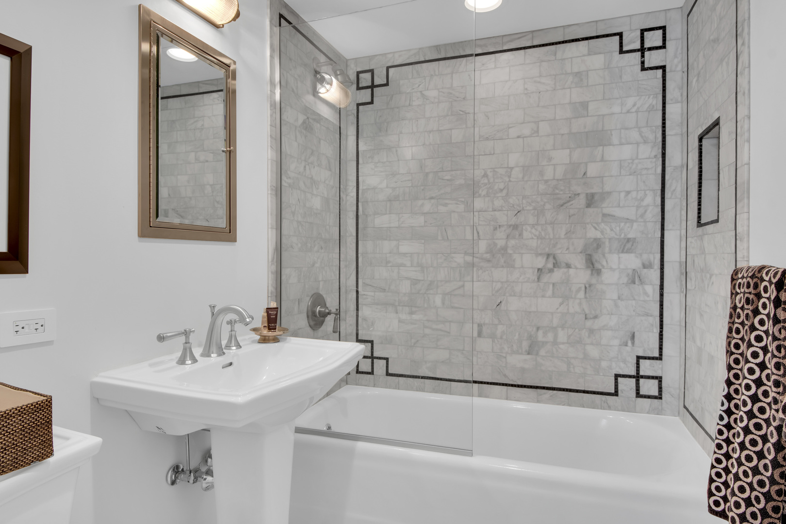 1380 Elm Tree Road Lake Forest, IL 60045 - Photo 26 of 43 a bathroom with a sink and a shower