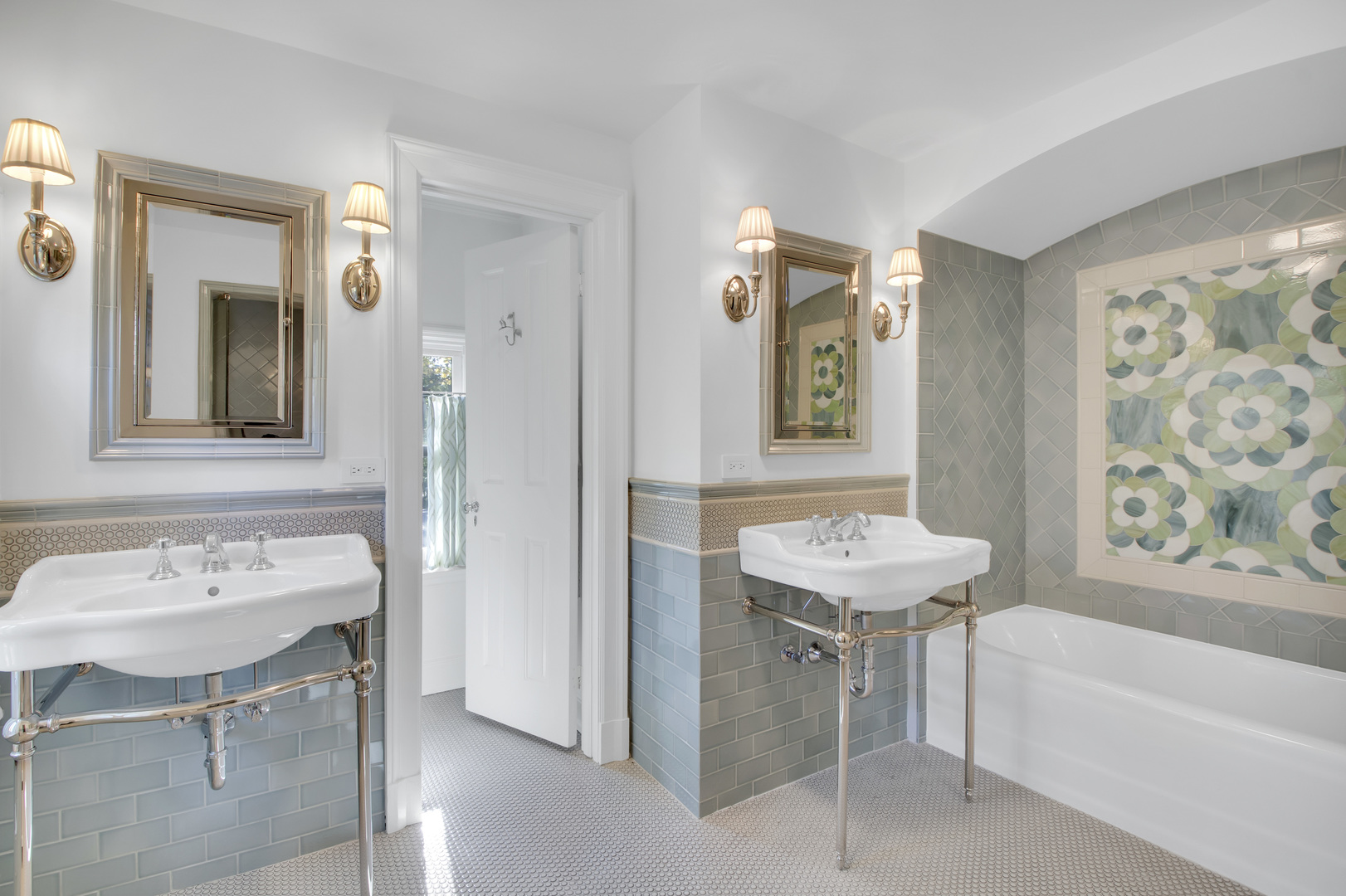 1380 Elm Tree Road Lake Forest, IL 60045 - Photo 31 of 43 a bathroom with a sink a bathtub and a mirror