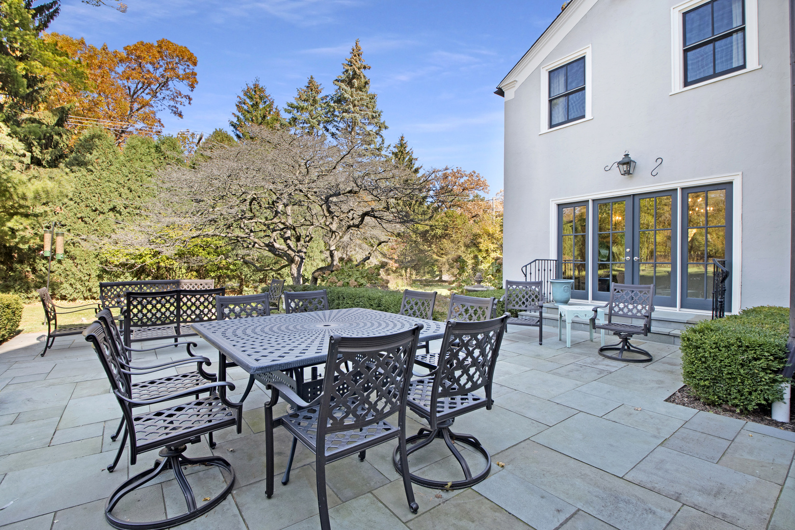 1380 Elm Tree Road Lake Forest, IL 60045 - Photo 37 of 43 a view of a patio with a table and chairs