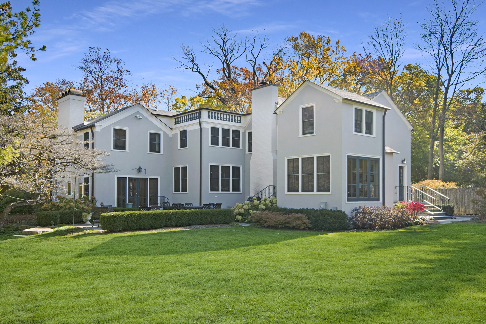 1380 Elm Tree Road Lake Forest, IL 60045 - Photo 39 of 43 a front view of a house with garden and trees