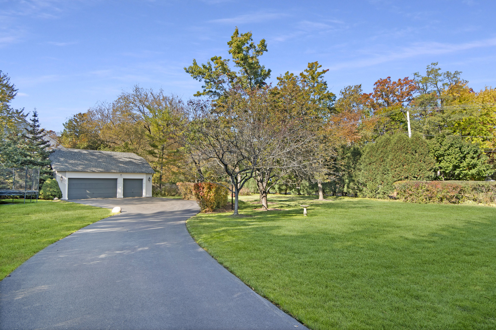 1380 Elm Tree Road Lake Forest, IL 60045 - Photo 40 of 43 a front view of a house with a yard