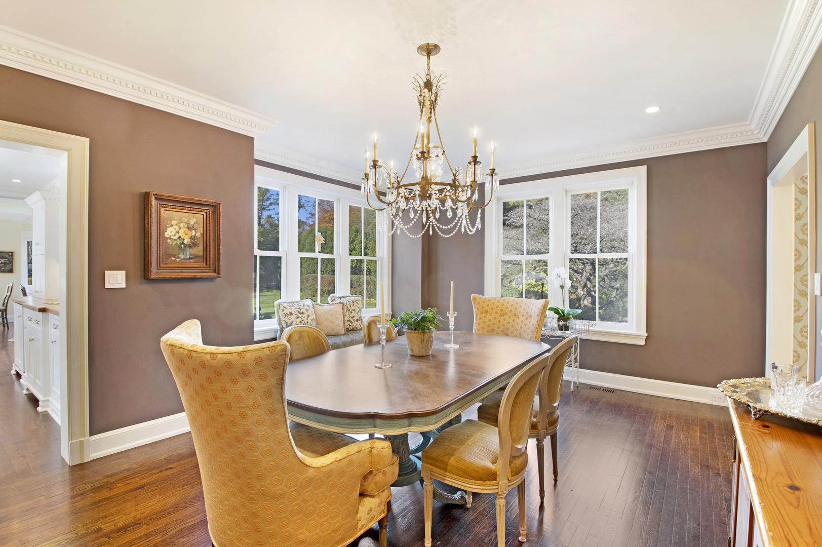 1380 Elm Tree Road Lake Forest, IL 60045 - Photo 7 of 43 a dining room with furniture a chandelier and wooden floor