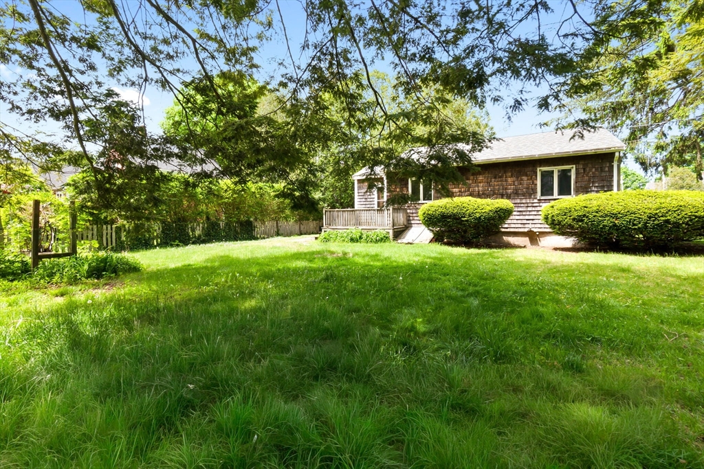 71 Union Street Hamilton, MA 01982 - Photo 21 of 21 a front view of a house with yard and green space