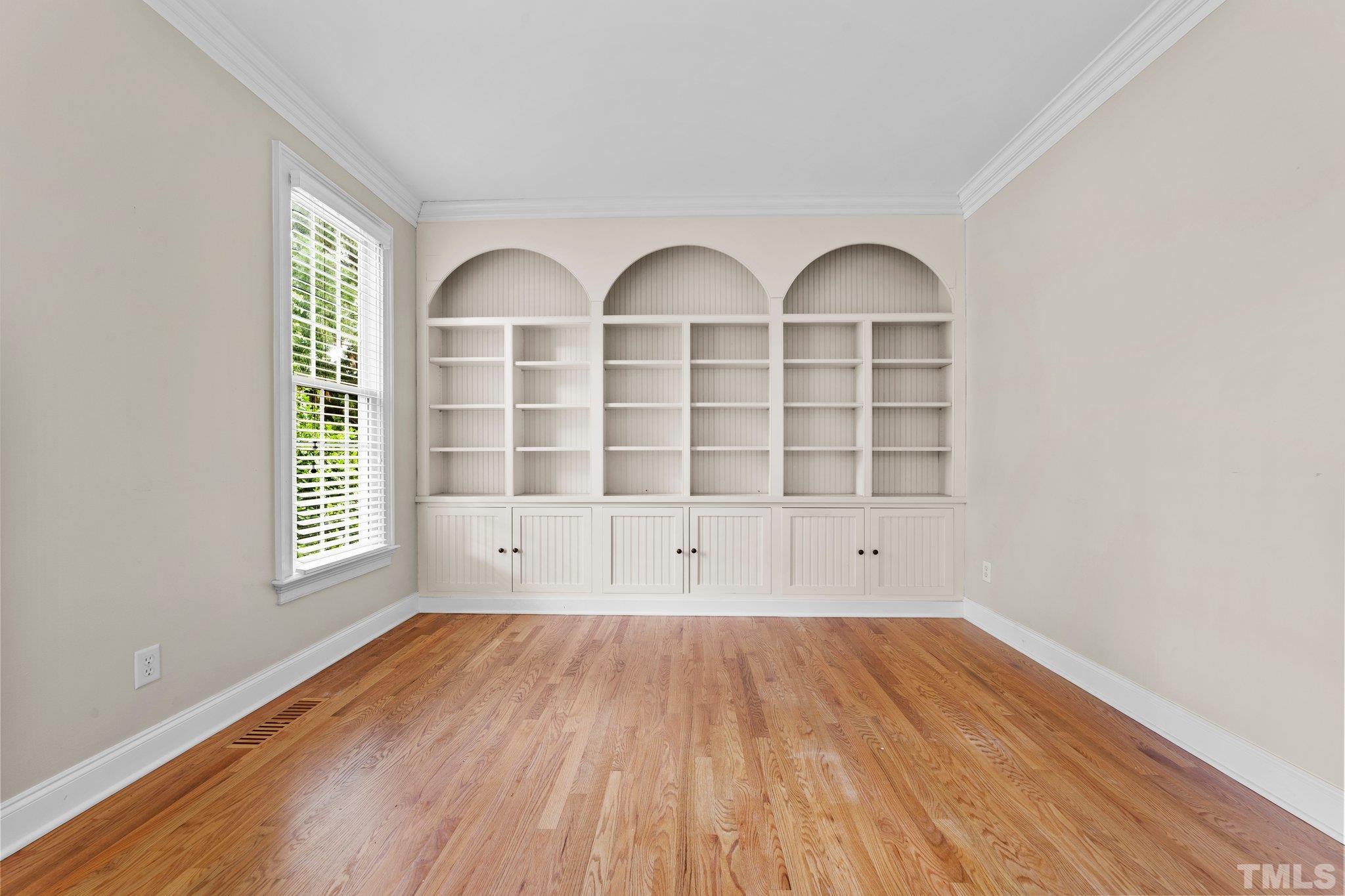 4012 Grandbridge Drive Apex, NC 27539 - Photo 18 of 51 a view of wooden floor in a room