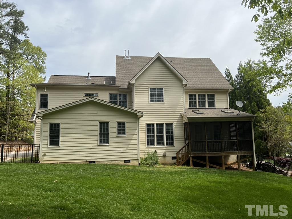 4012 Grandbridge Drive Apex, NC 27539 - Photo 2 of 51 a front view of a house with a garden