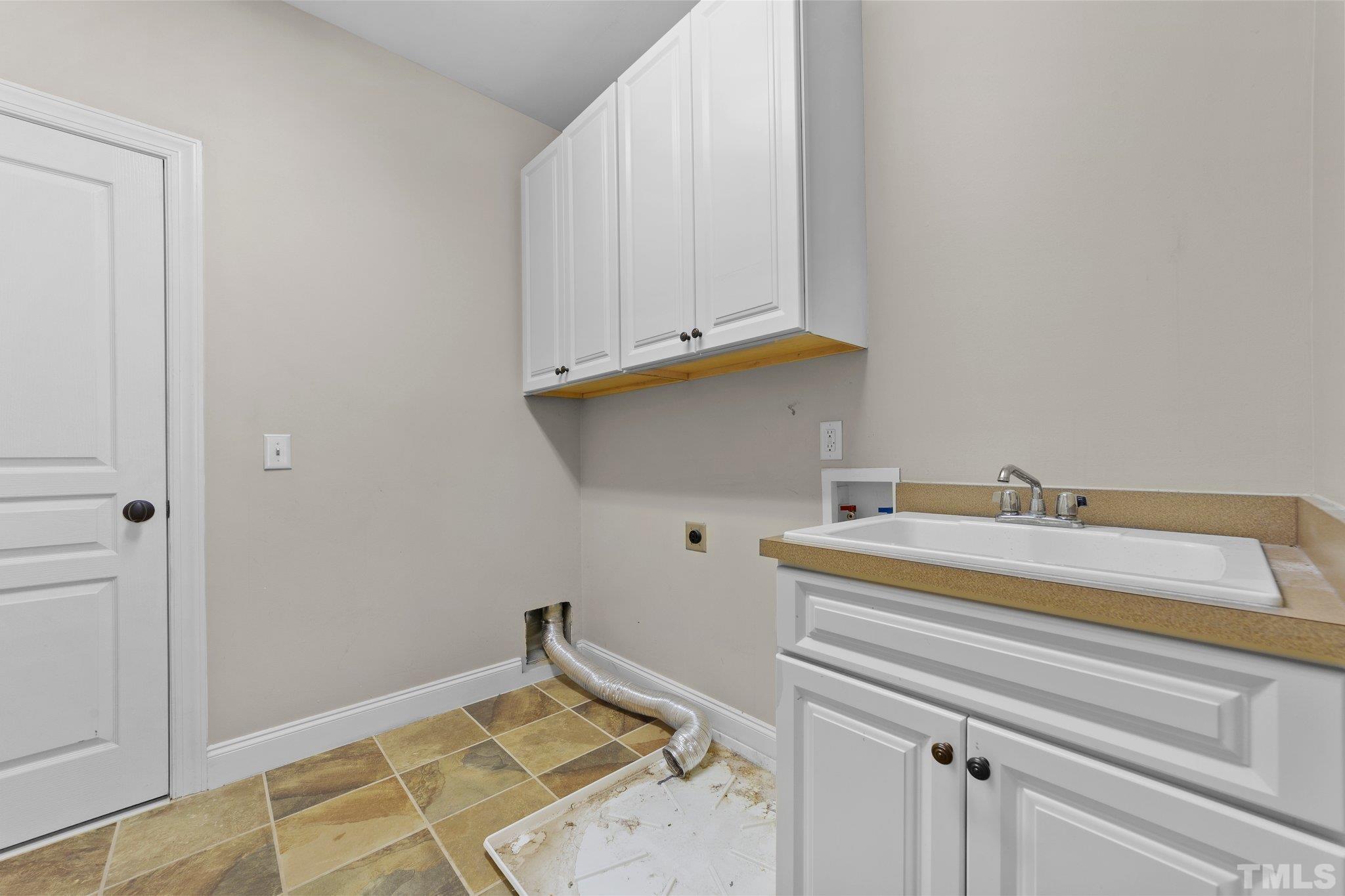 4012 Grandbridge Drive Apex, NC 27539 - Photo 36 of 51 a view of storage and utility room