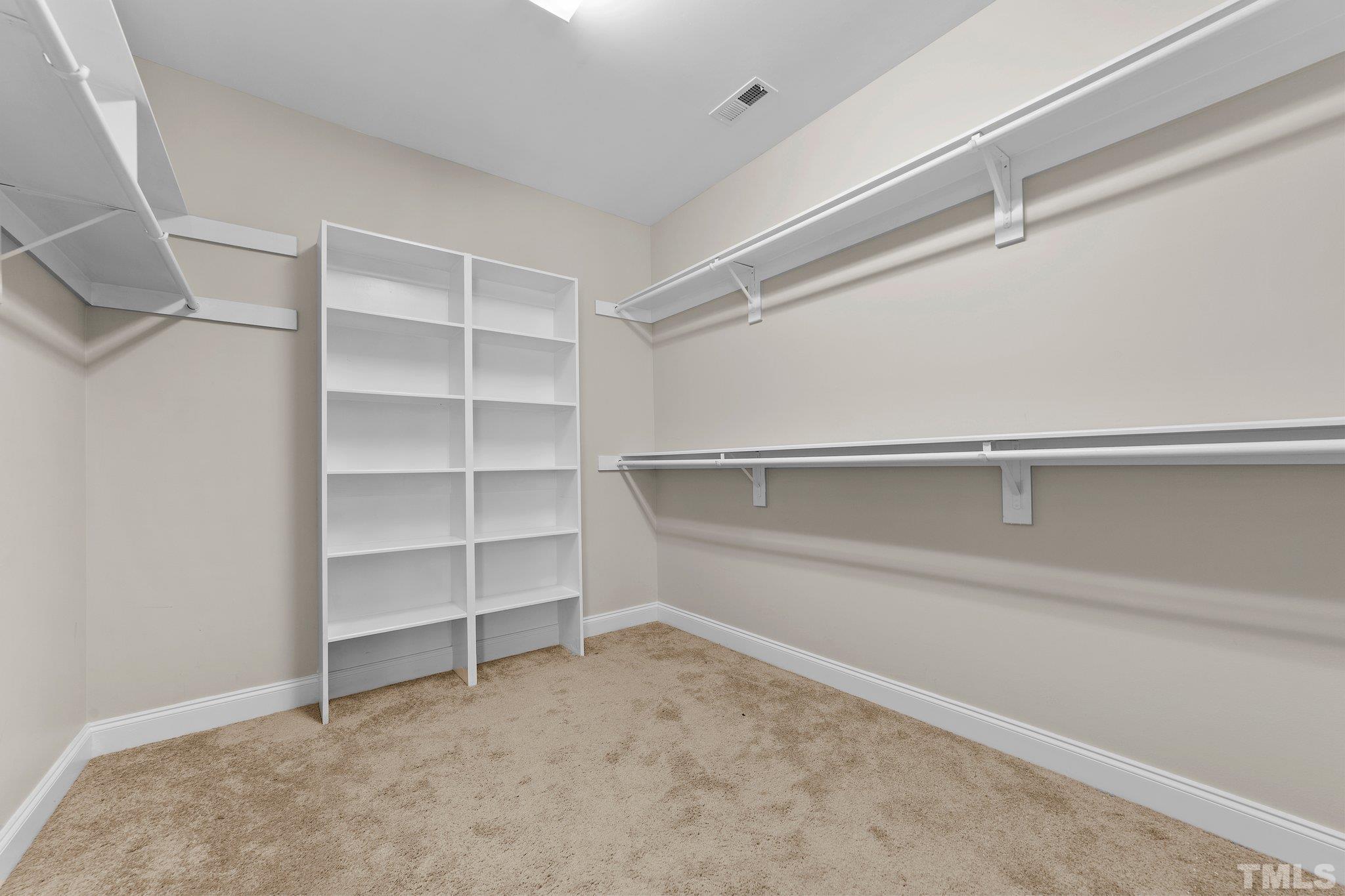 4012 Grandbridge Drive Apex, NC 27539 - Photo 44 of 51 a view of an empty walk in closet