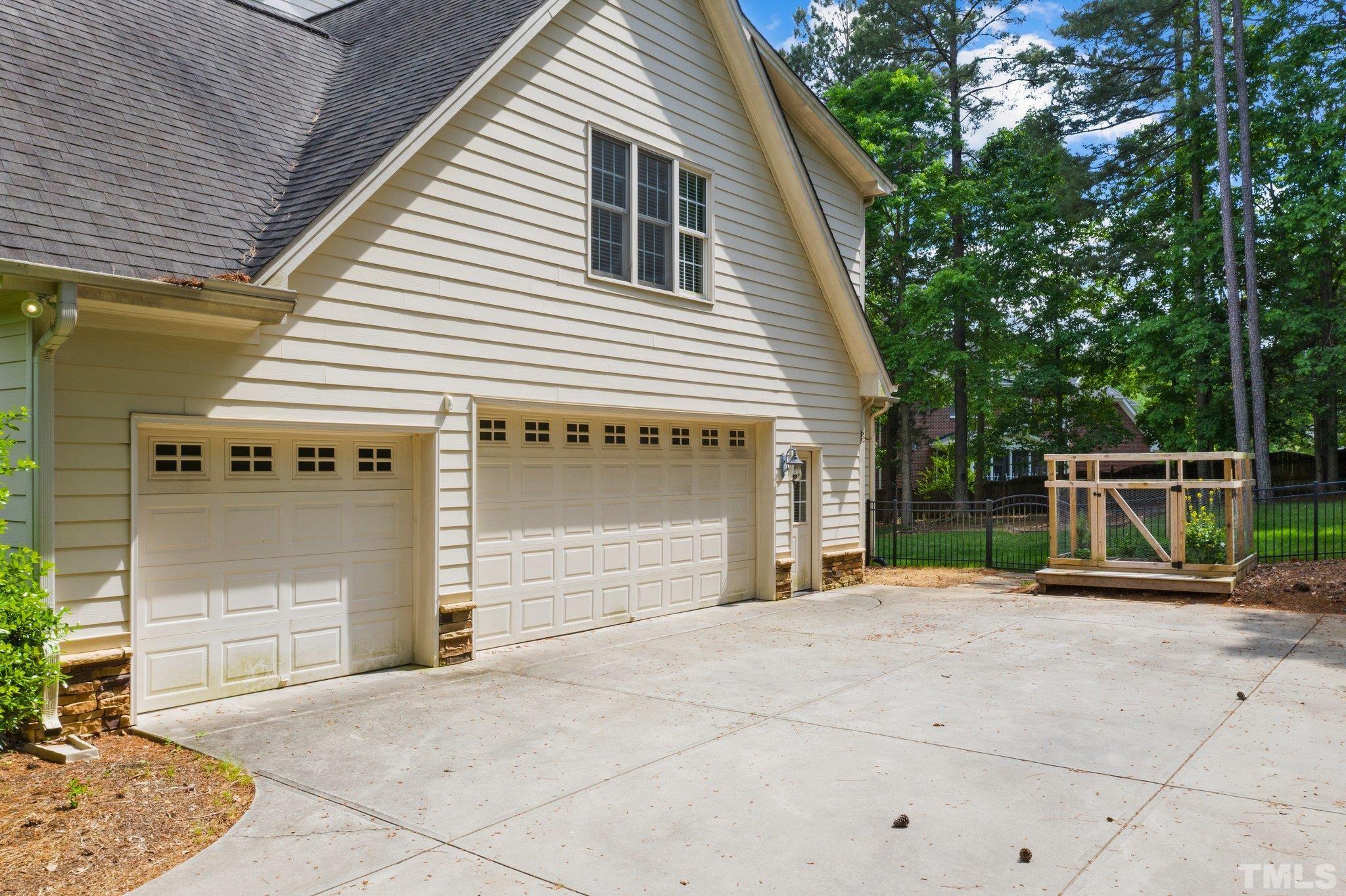 4012 Grandbridge Drive Apex, NC 27539 - Photo 9 of 51 a front view of a house with garage