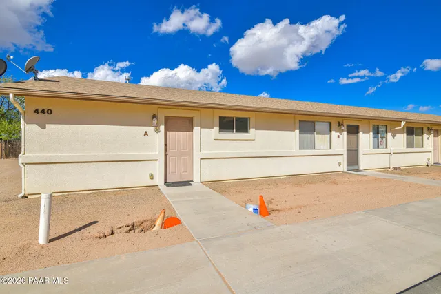 a car parked in front of a house