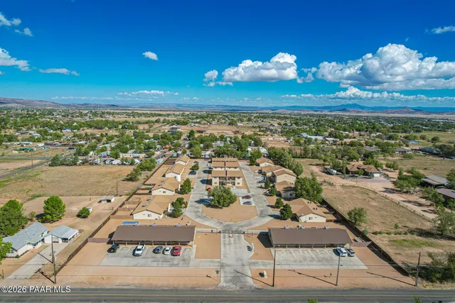 an aerial view of a building with outdoor space
