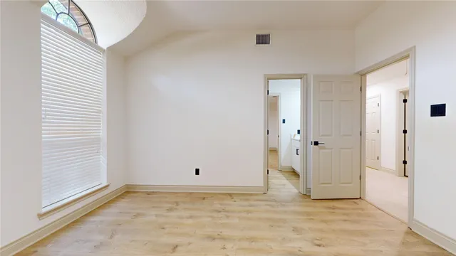 a bathroom with a sink a mirror and a shower