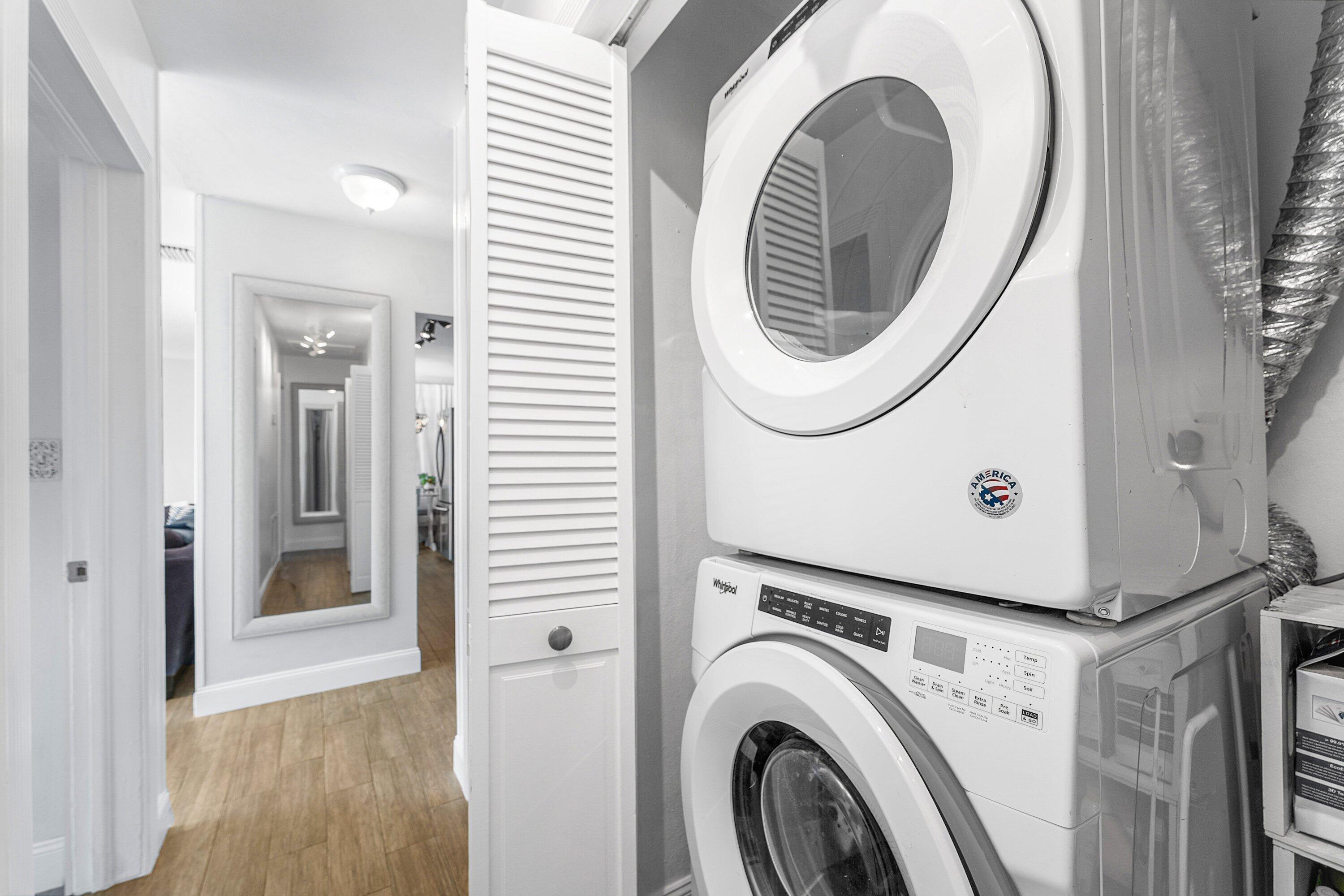 817 Buttonwood Road North Palm Beach, FL 33408 - Photo 21 of 39 a utility room with dryer and washer