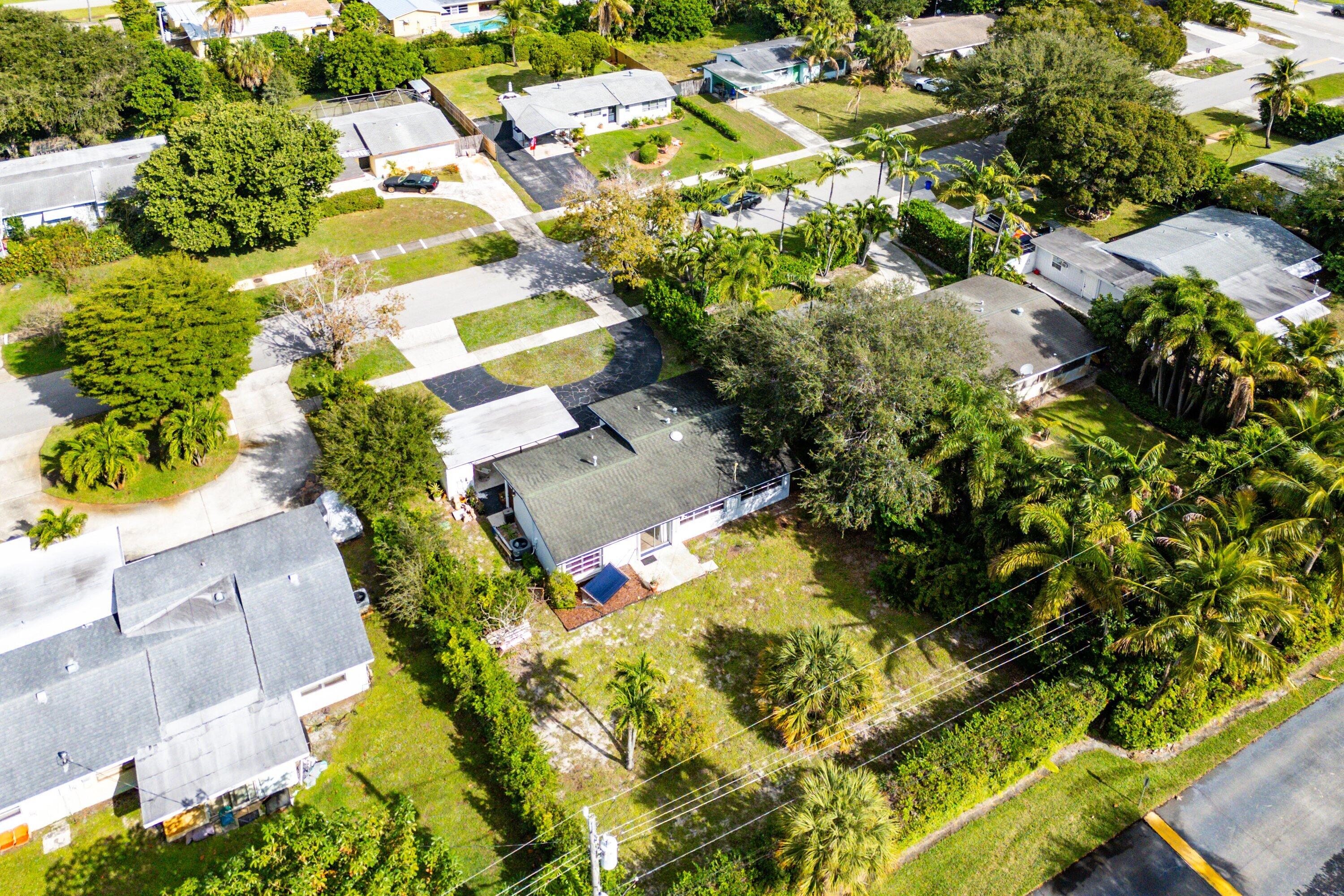 817 Buttonwood Road North Palm Beach, FL 33408 - Photo 33 of 39 a view of yard with green space