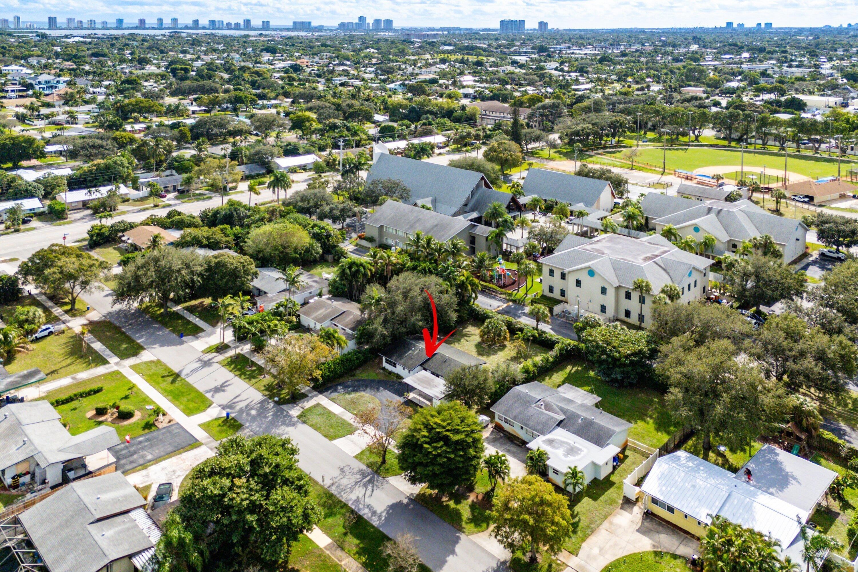 817 Buttonwood Road North Palm Beach, FL 33408 - Photo 35 of 39 an aerial view of residential houses with outdoor space