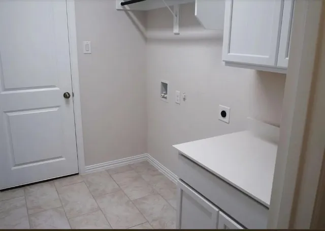 a bathroom with a sink a toilet a mirror a bathtub and shower