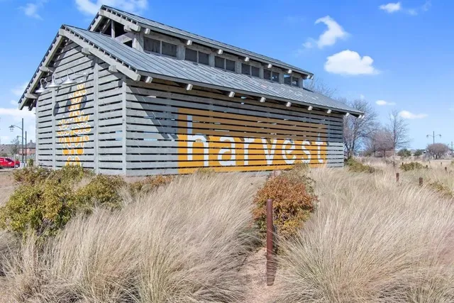 a view of a room with wooden walls