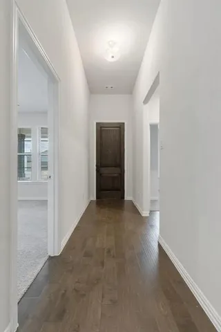 an empty room with a bathroom