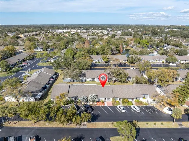 an aerial view of residential house with outdoor space