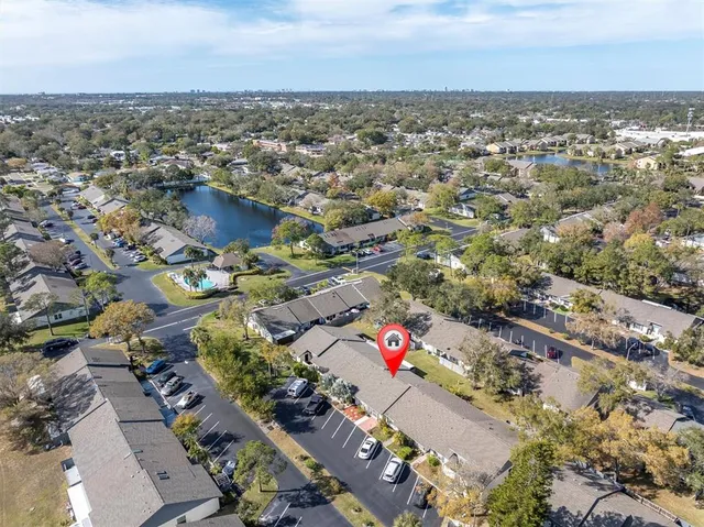 an aerial view of a city with lots of residential buildings