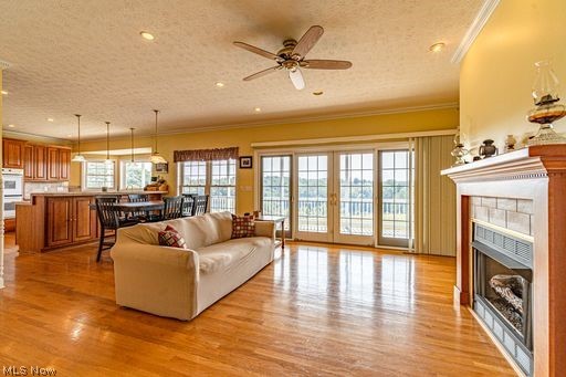 3170 Victory Ridge Road Harrisville, WV 26362 - Photo 9 of 35 Living room flows nicely in to the kitchen, and allthe windows offer an amazing view of the property.
