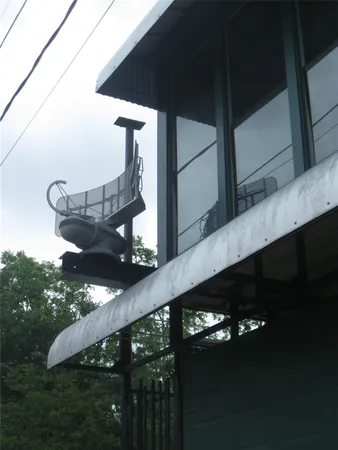 a view of swimming pool from a balcony