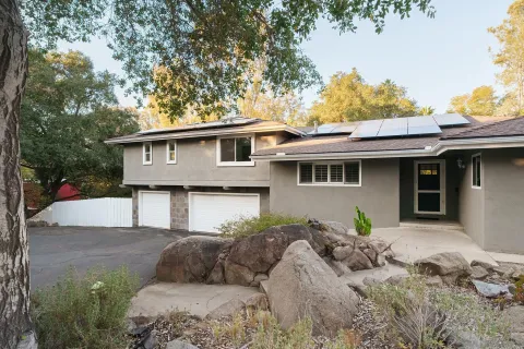 a front view of a house with a outdoor space