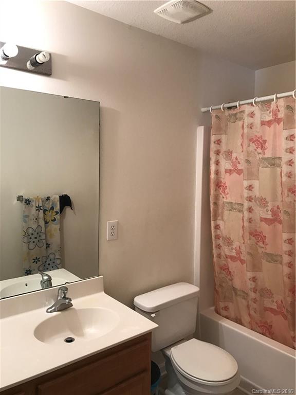 6412 Trotters Ridge Road Charlotte, NC 28227 - Photo 8 of 20 a bathroom with a sink toilet and shower