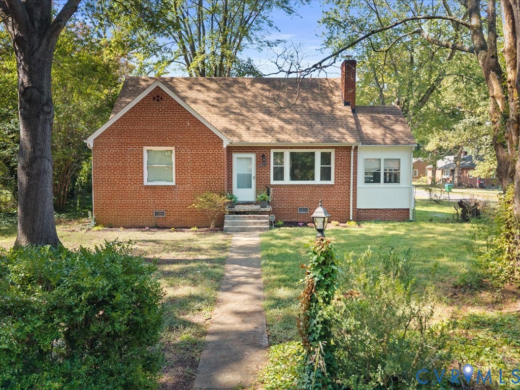 front view of house with a yard
