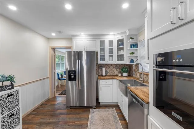 a vase of flowers sitting on a table