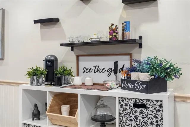 a work room with furniture and windows