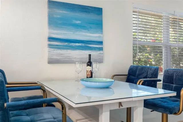 a spacious bedroom with a large bed and a window