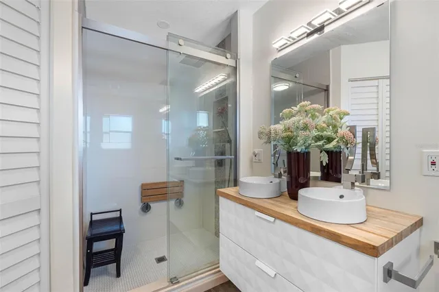 a front view of a house with outdoor seating