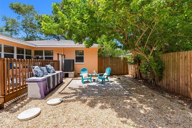 an aerial view of a houses with a lake view