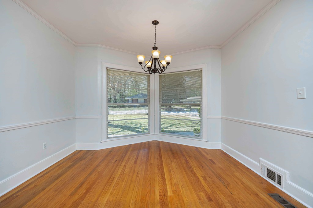 1712 Marilon Drive Columbus, GA 31906 - Photo 3 of 15 a view of wooden floor chandelier and window in a room