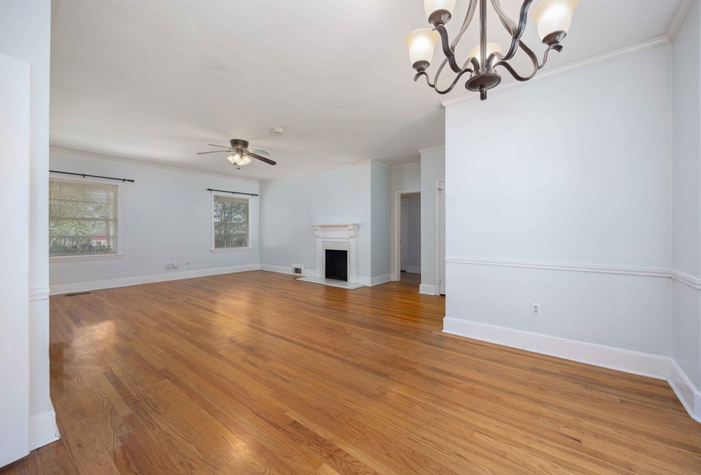 1712 Marilon Drive Columbus, GA 31906 - Photo 4 of 15 wooden floor in an empty room with a window