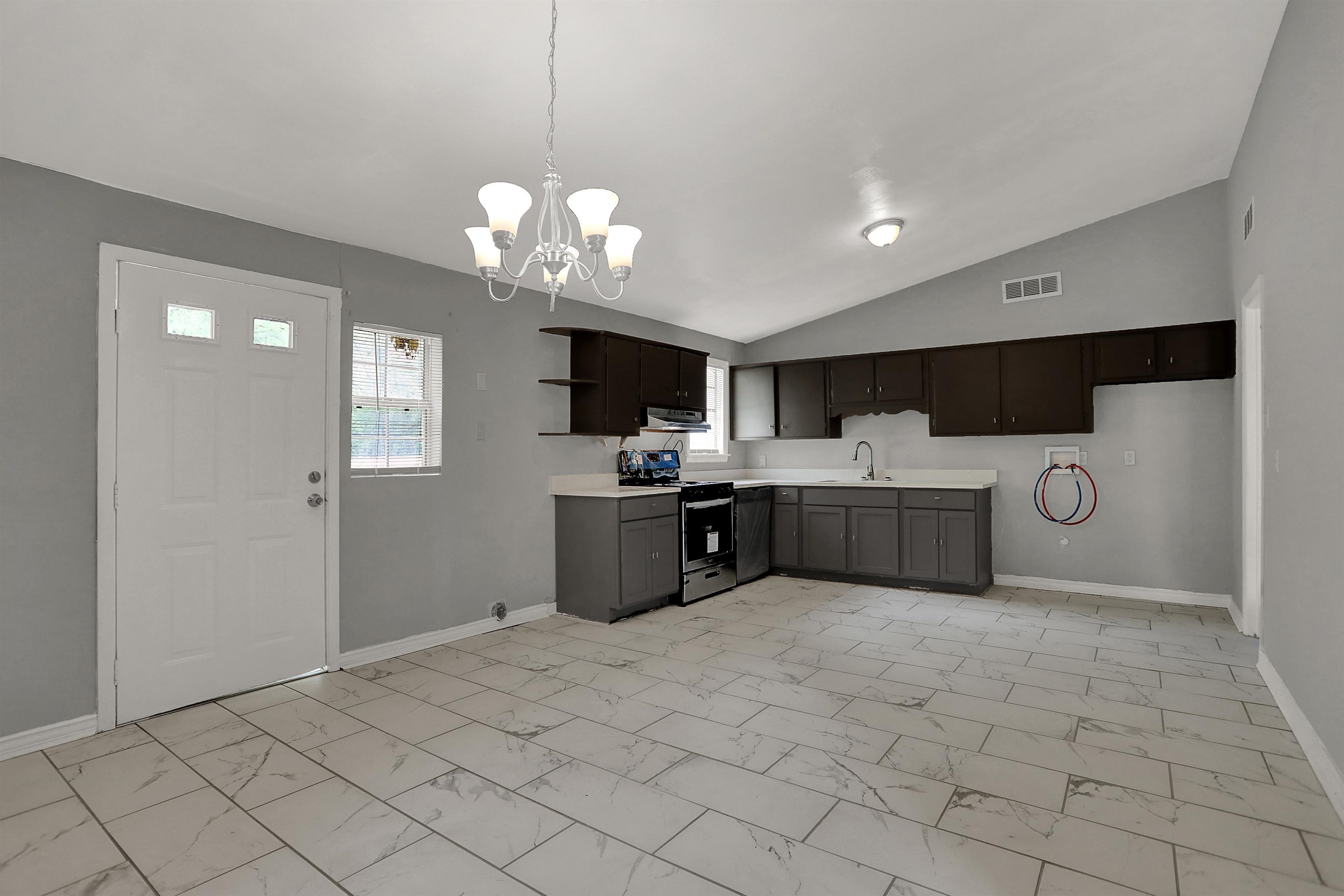 4477 Neely Road Memphis, TN 38109 - Photo 12 of 25 a view of a kitchen with a sink and dishwasher a kitchen view