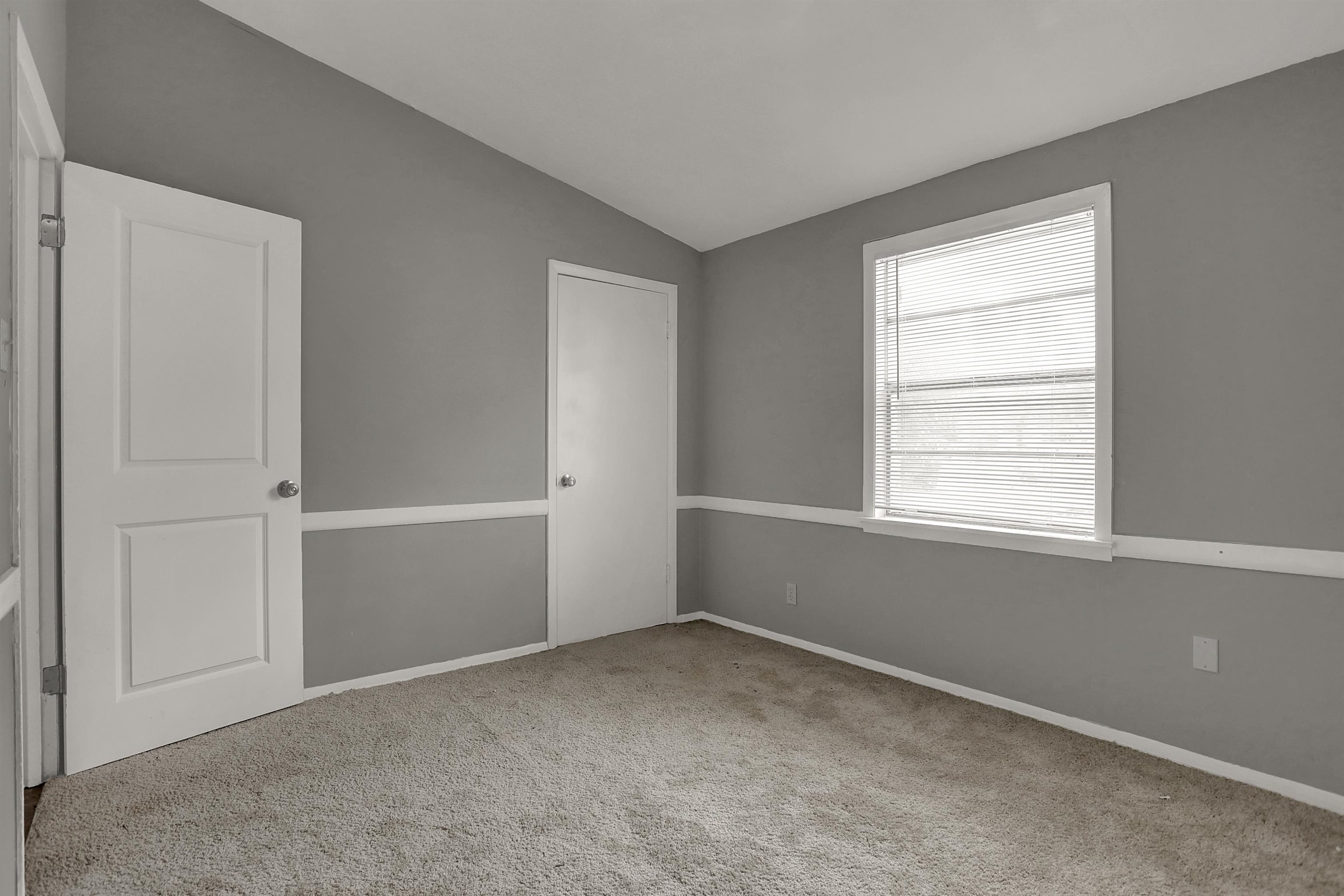 4477 Neely Road Memphis, TN 38109 - Photo 17 of 25 a view of an empty room with a window