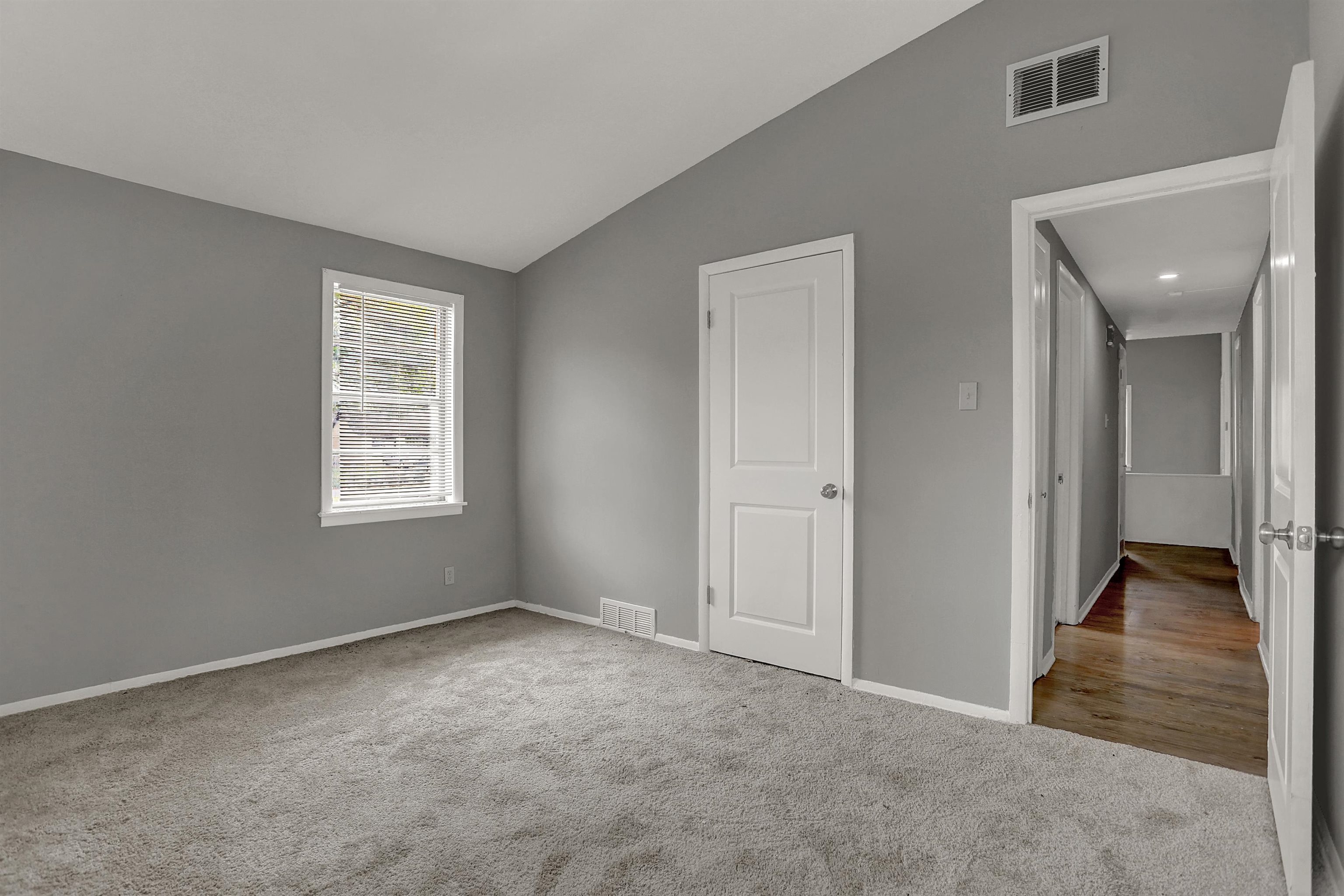 4477 Neely Road Memphis, TN 38109 - Photo 19 of 25 an empty room with windows and closet