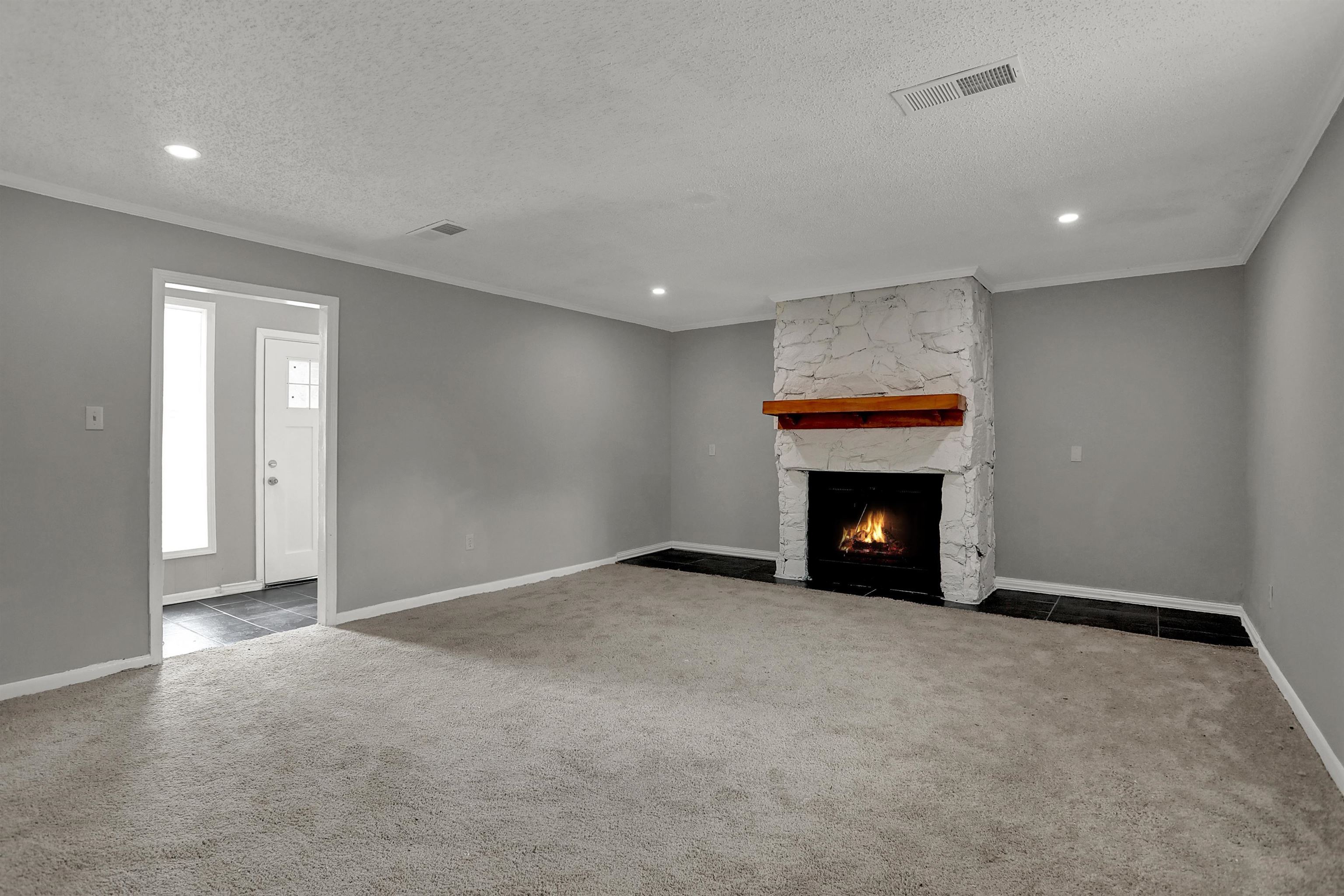 4477 Neely Road Memphis, TN 38109 - Photo 7 of 25 a view of an empty room with a fireplace