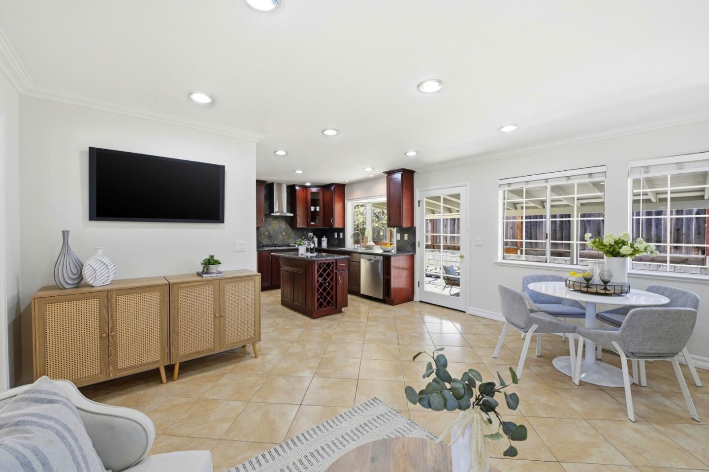 6207 McAbee Road San Jose, CA 95120 - Photo 18 of 48 a living room with furniture and a flat screen tv