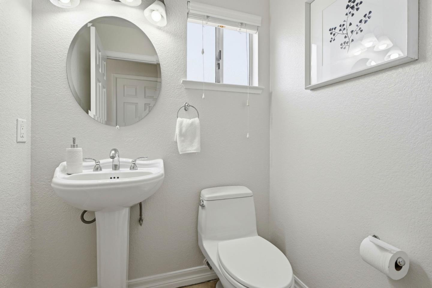 6207 McAbee Road San Jose, CA 95120 - Photo 20 of 48 a bathroom with a toilet sink and mirror