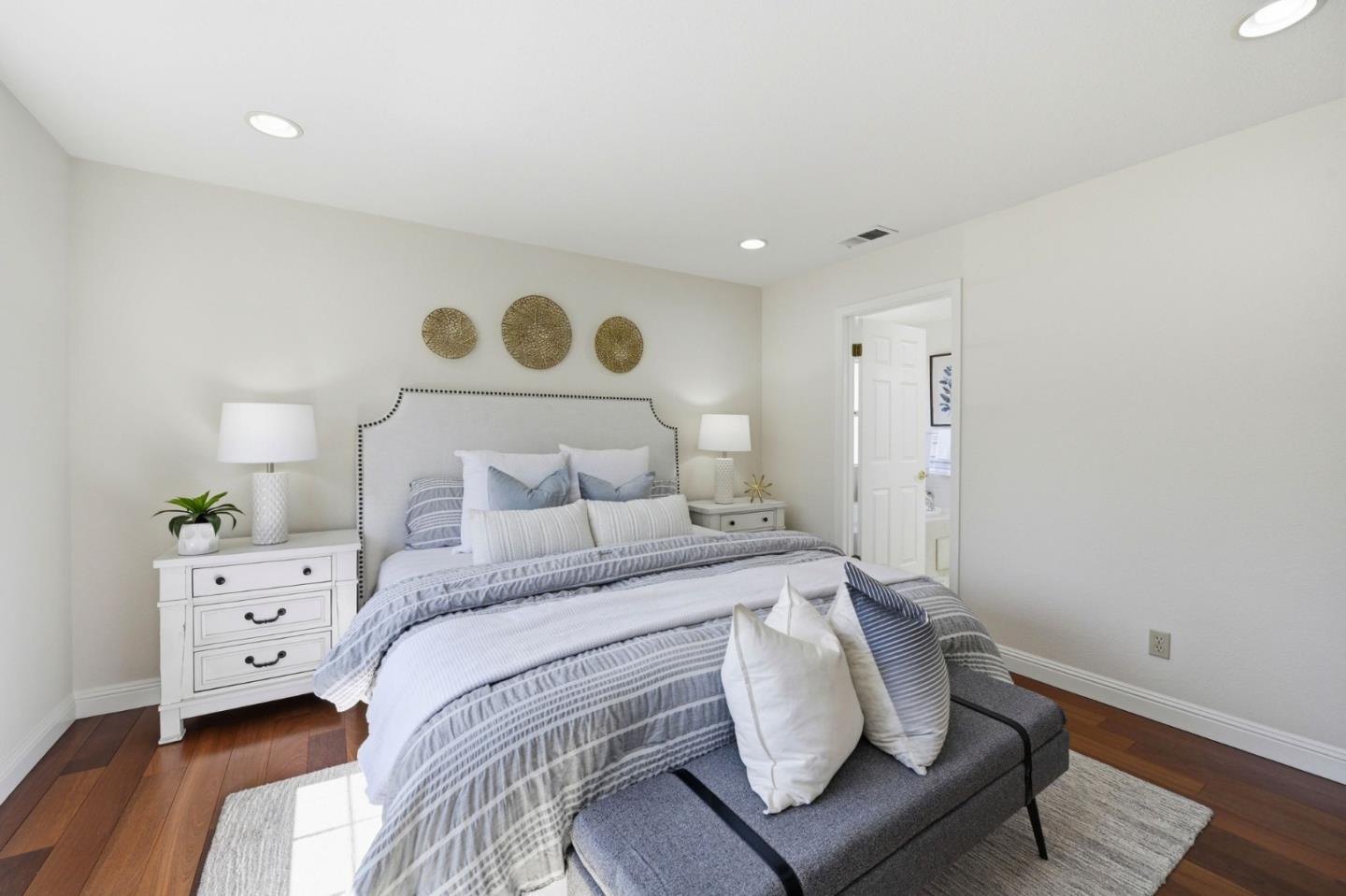 6207 McAbee Road San Jose, CA 95120 - Photo 23 of 48 a bedroom with a bed and lamp